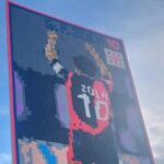 coni,-zola-insignito-della-stella-d’oro-e-ritratto-in-un-mosaico-in-lego